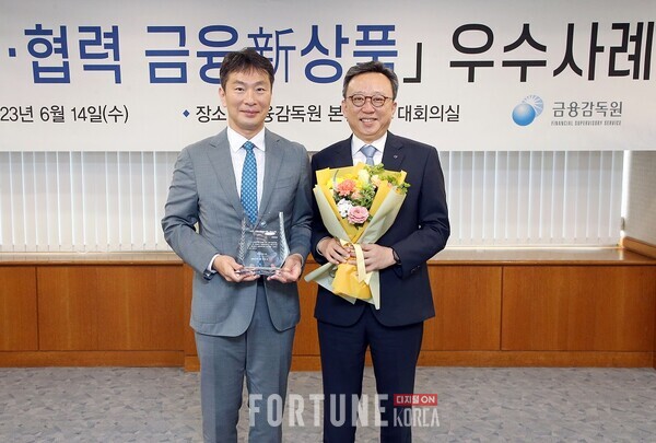 정상혁 신한은행장(오른쪽)과 이복현 금융감독원장.